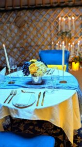 Romantic private dining for two in a candlelit yurt restaurant at Hawthorn Hideaway in Yorkshire, intimate luxury experience for couples.