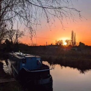 Sunset views from the hot tub and canal boat at Hawthorn Hideaway on the Chesterfield Canal. Romantic woodland waterside retreat in Yorkshire