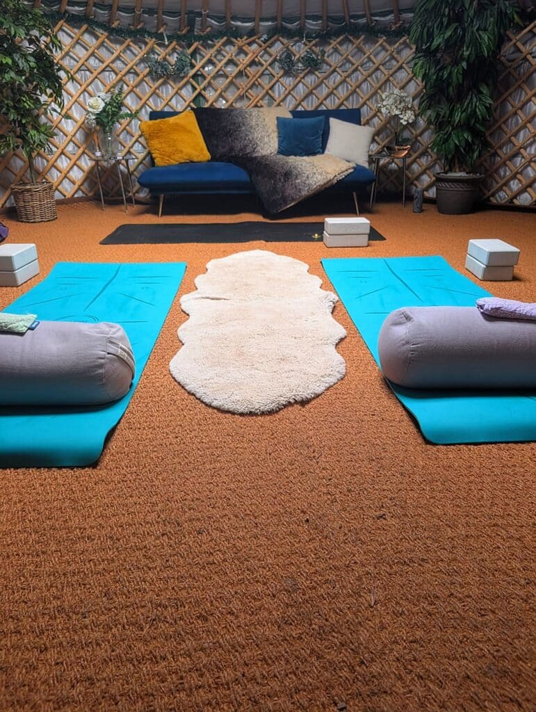 Couples yoga in the yurt